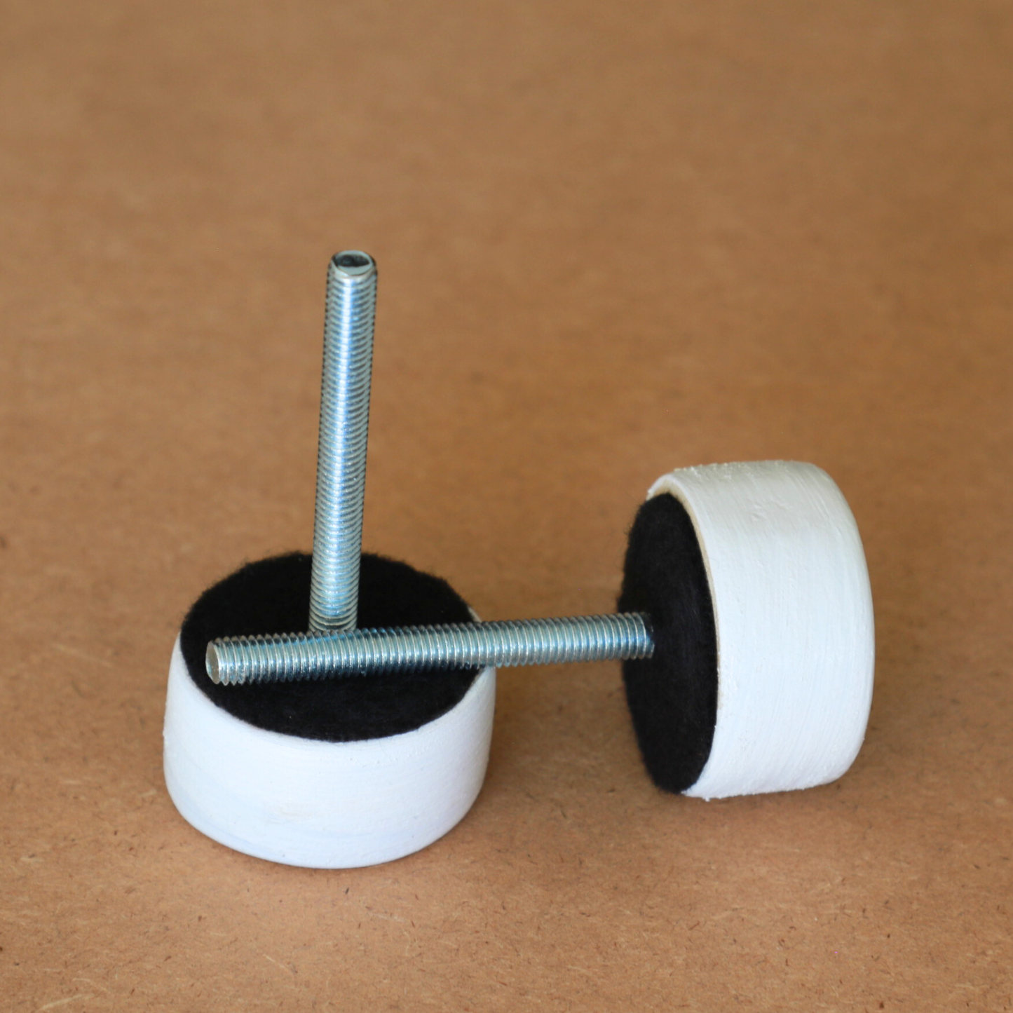 White sustainable wooden baby activity gym with travel bag, made locally by Two Eddyphants South Africa, wooden nuts